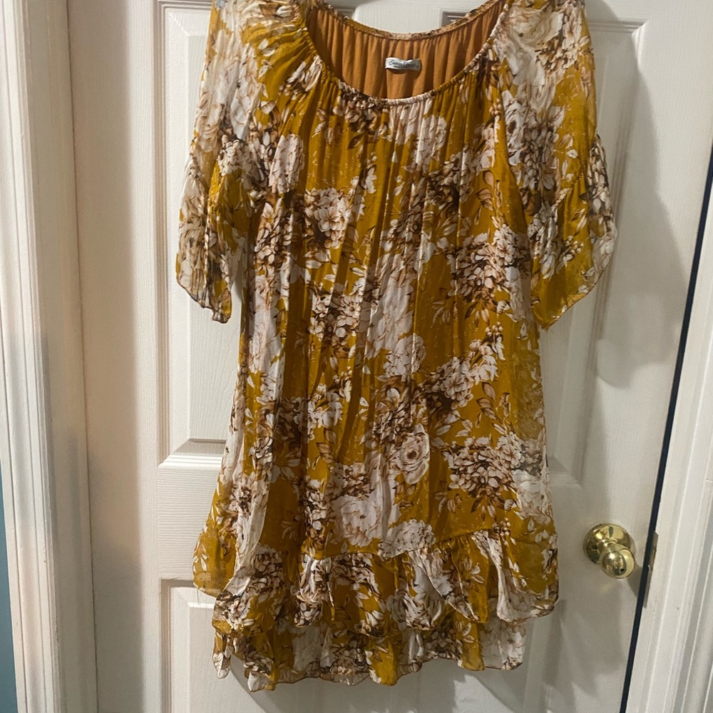 This is a very silky dress very silky  made in Italy has underline silk slip